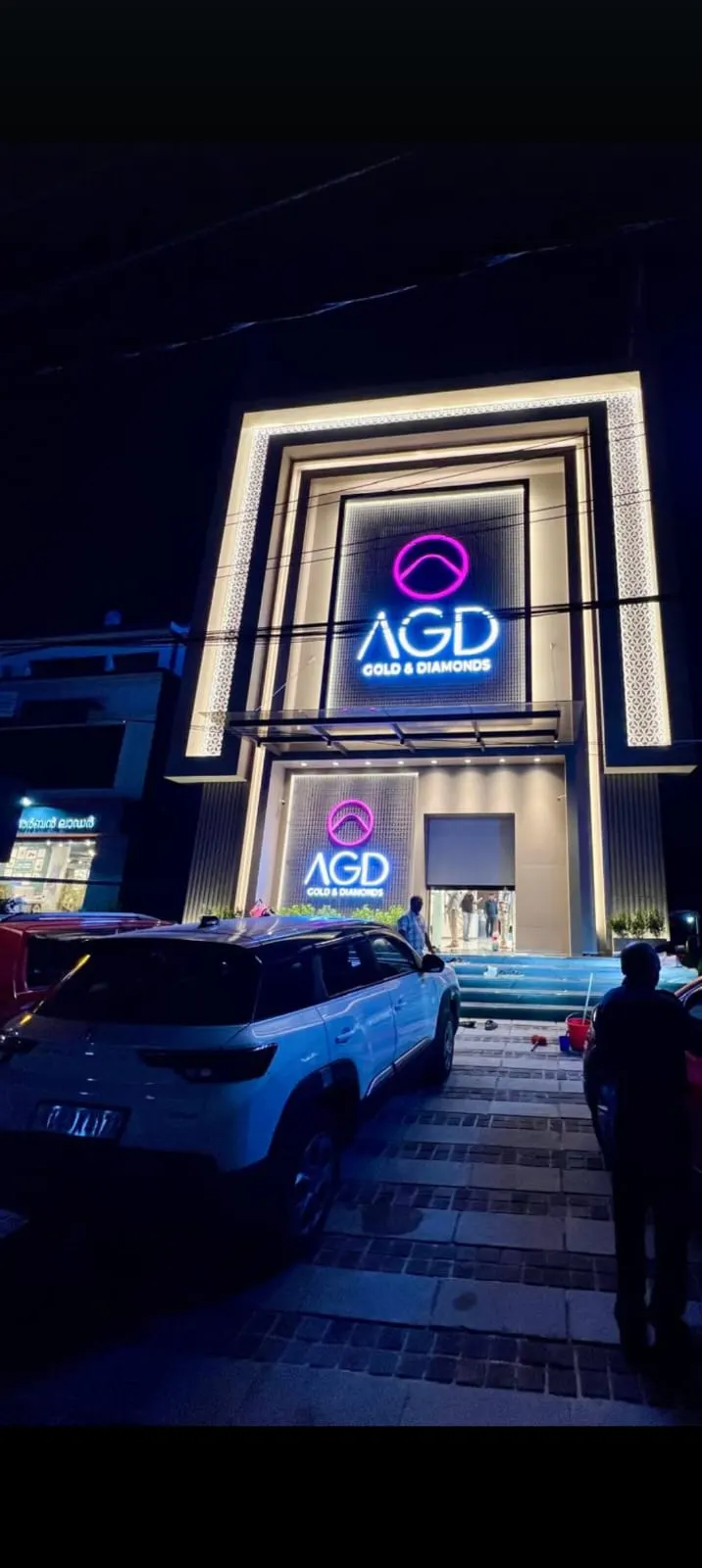 The showroom front at night, Arabian Gold & Diamond, Kochi