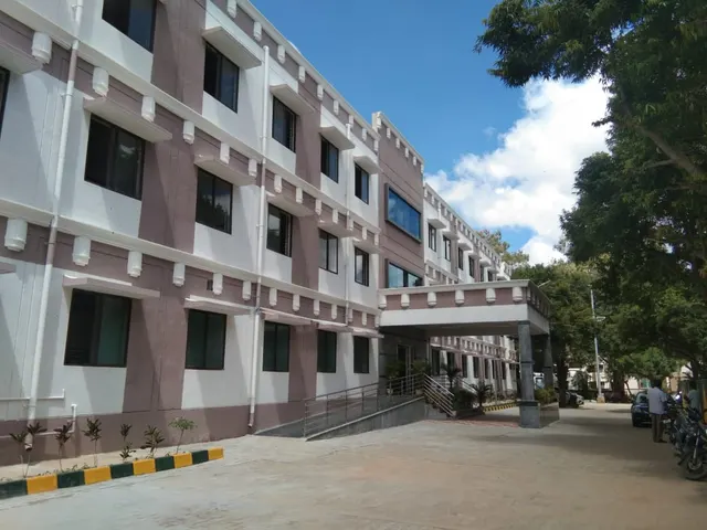 Window hoods and brackets along the main block, CMH Hospital, Kolar
