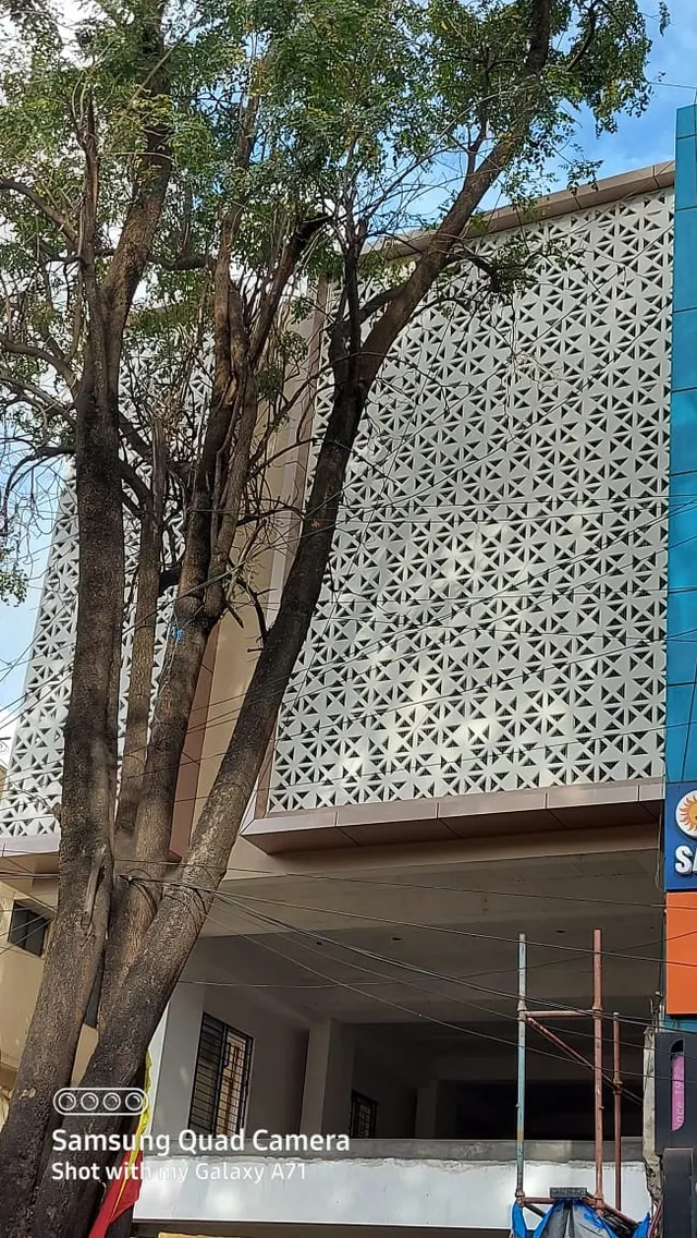 The screens seen through the trees, Commercial Complex, Malleswaram