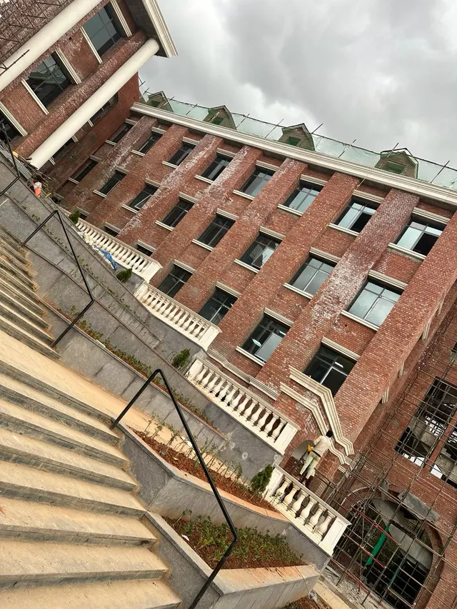 A balustrade following the staircase, Harrow International School