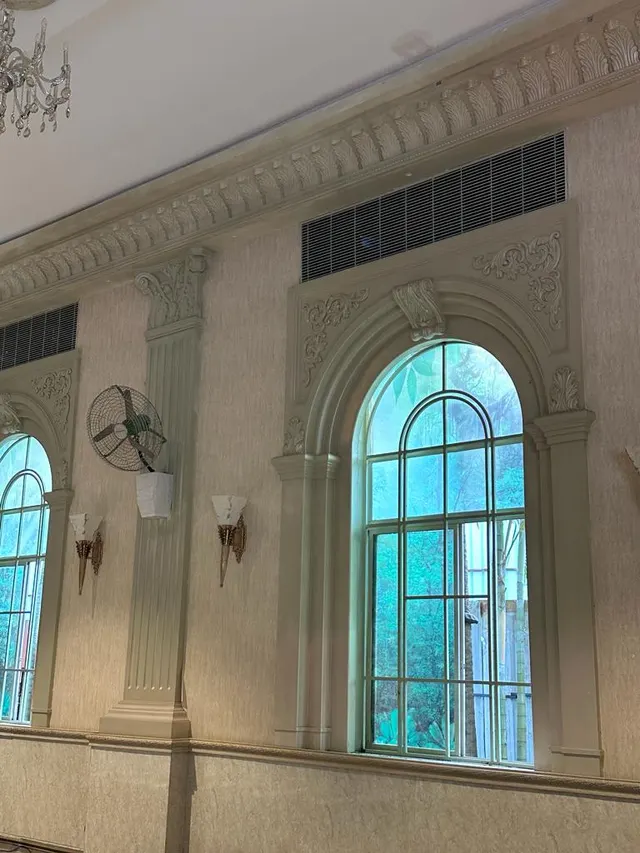 An arched window surround and pilasters, Princess Golf